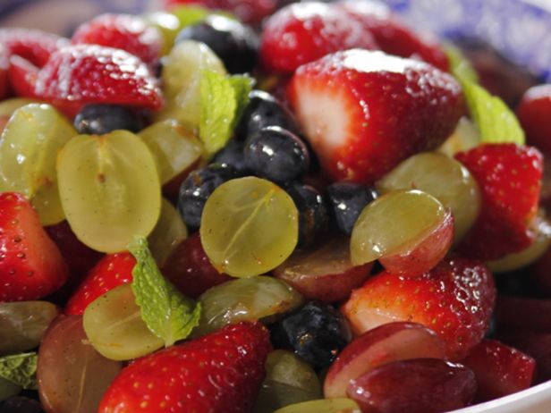 a close up of a bowl of fruit salad