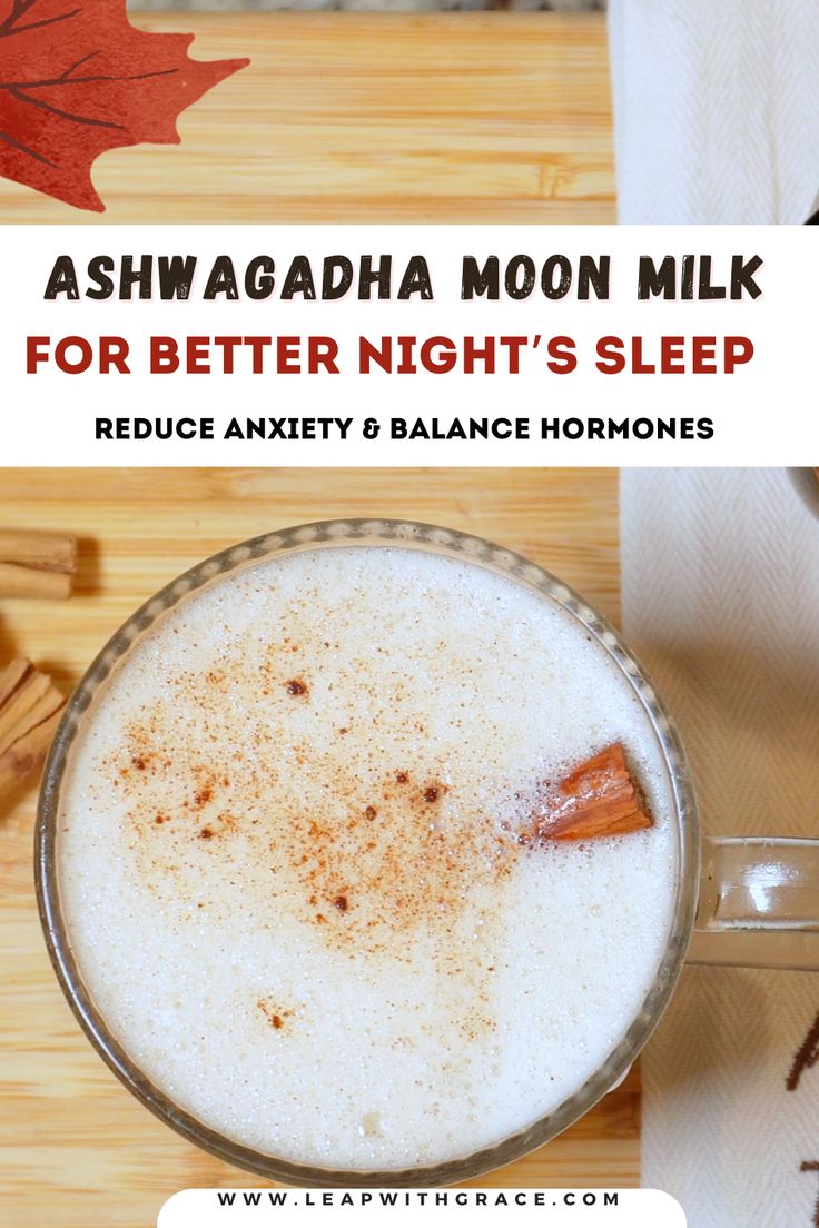 a cup of milk with cinnamon on top and the words ashgada moon milk for better night's sleep