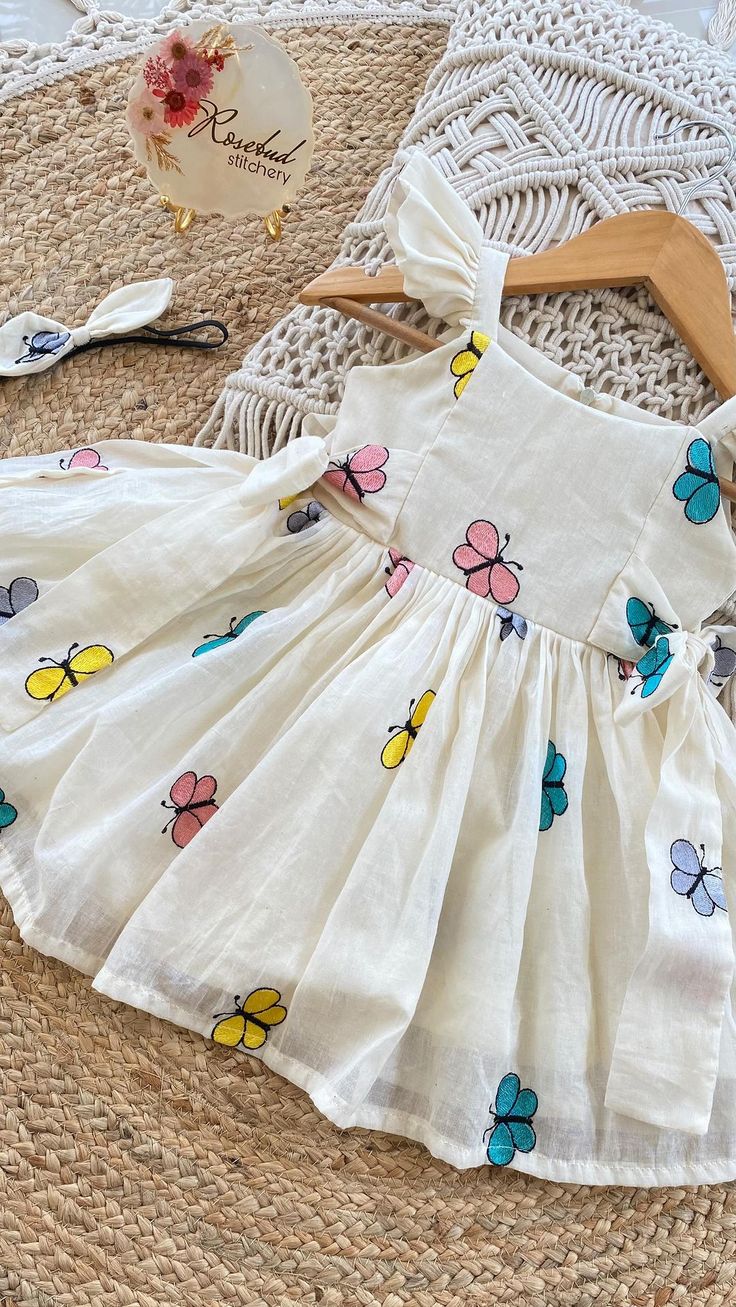 in Baby Girl Embroidery Dress, Embroidery Frocks For Kids, Kids Embroidery Dress, Butterfly Dress Design, Baby Frocks Designs Cotton, Summer Cotton Dresses, Baby Dress Embroidery, Cotton Frock