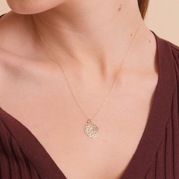 "Center your energy on something shiny and a reminder of happiness. Introducing the diamond chakra pendant that'll clean your negative energy. The stylish diamond stone will do the magic when you want to focus on yourself. F E A T U R E S * Made to Order. * Gold KT: 14K * Choice of Gold Color: Yellow Gold, Rose Gold, White Gold * Gem Stone: Genuine Diamond * Diamond-Cut: Round * Diamond Carat: 0.01 ct * Pendant Height: 18 mm / 0.70 inch * Pendant Width: 11 mm / 0.43 inch * Diamond Color-Clarity: Delicate Flower Shaped Jewelry With Diamond Accents, Delicate Diamond Flower Pendant Jewelry, Delicate Flower-shaped Jewelry With Diamond Accents, Exquisite Yellow Gold Flower Shaped Necklace, Fine Jewelry: 14k Gold Diamond Necklace With Flower Pendant, Fine Jewelry 14k Gold Diamond Flower Pendant Necklace, Gold Diamond Necklace In Flower Shape For Gift, Gold Diamond Necklace With Flower Shape For Gifts, Dainty 14k Gold Diamond Necklace With Flower Pendant