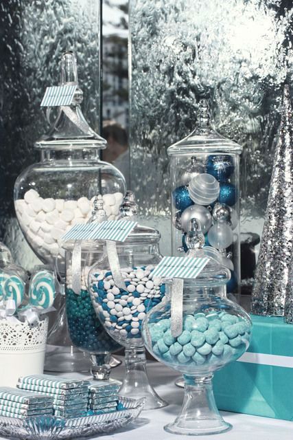 a table topped with lots of candy and candies