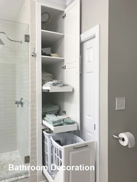 an open door to a bathroom with towels and toiletries in the closet next to it