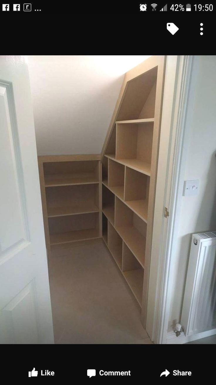 the closet is empty and ready to be used for storage or use as an office space