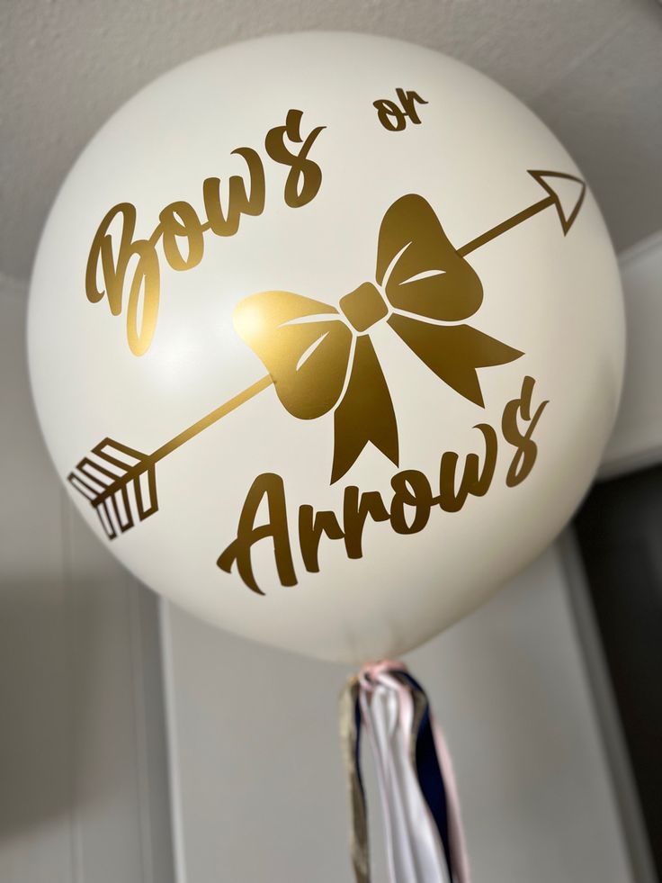 a balloon with the words bows and arrows painted on it