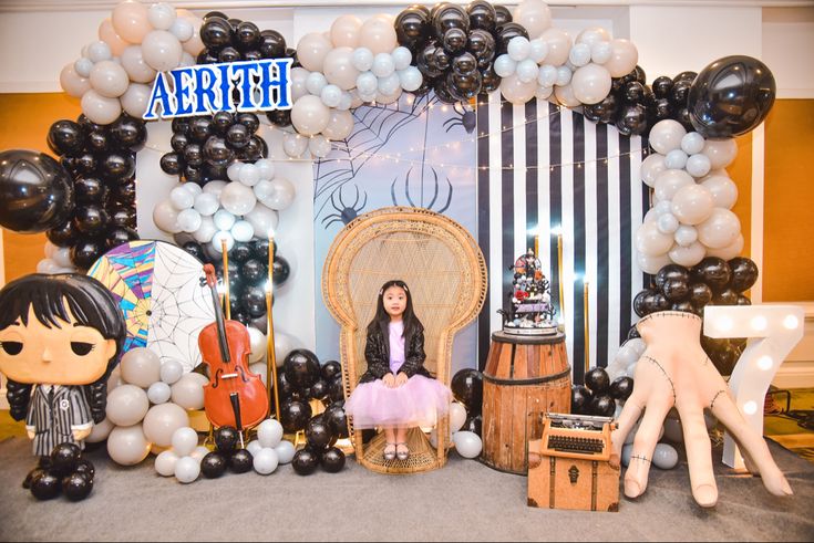 a birthday party with balloons and decorations