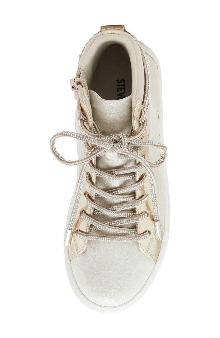 Jewel-encrusted laces add whimsical charm to a play-ready sneaker grounded by a durable platform cupsole. 1" heel Lace-up style; side zip closure Synthetic upper/textile lining/synthetic sole Imported Trendy Lace-up Sneakers With Zipper Closure, Jewel Encrusted, High Top Sneaker, Fabric Gift Bags, Nordstrom Store, Up Styles, Big Kids, High Top, Gift Bag