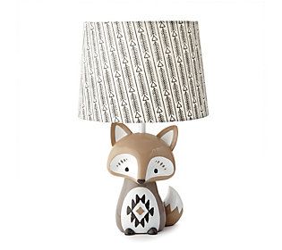 a lamp that has a fox on it