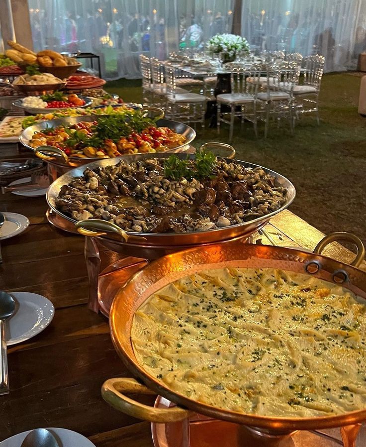 a buffet table with many different types of food on it