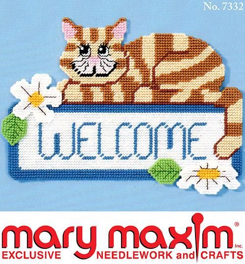 an image of a cross stitch cat on a welcome sign