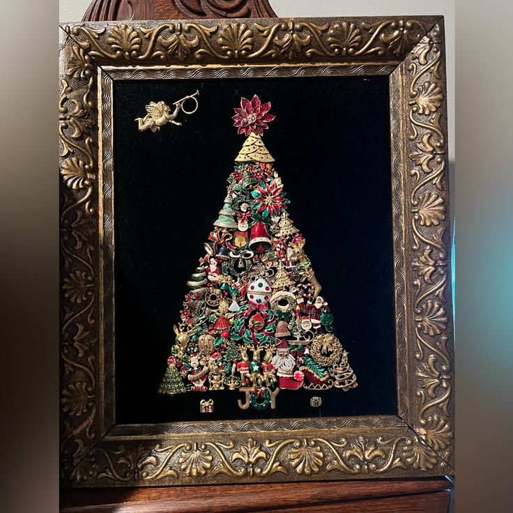 Handcrafted Jeweled Christmas Tree Made Of Broaches With Gold Frame Christmas Tree Made From Old Jewelry, Art With Old Jewelry, Christmas Jewelry Art, Christmas Button Art, Things To Make With Old Jewelry, Old Jewelry Crafts Ideas, Jewel Christmas Tree, Jewelry Tree Art, Costume Jewelry Christmas Tree