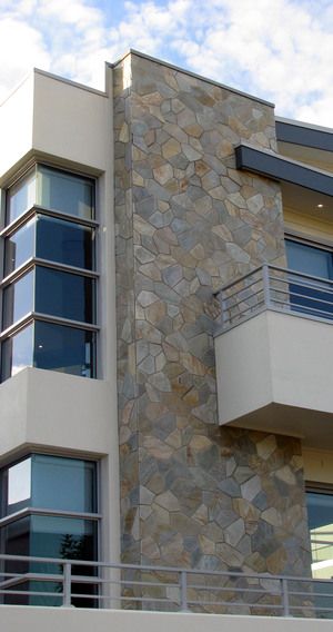 an apartment building with balcony and balconies