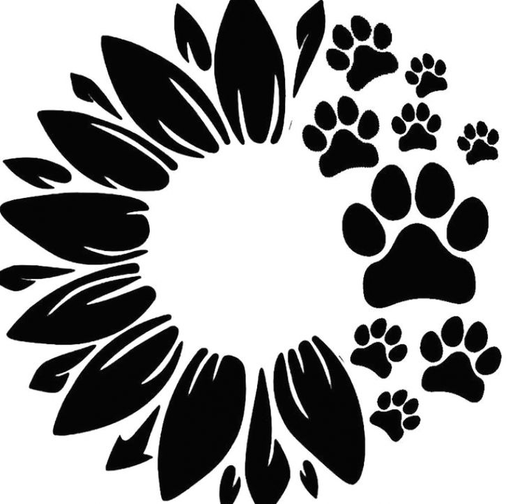 an animal paw print in the shape of a circle with paws and leaves around it