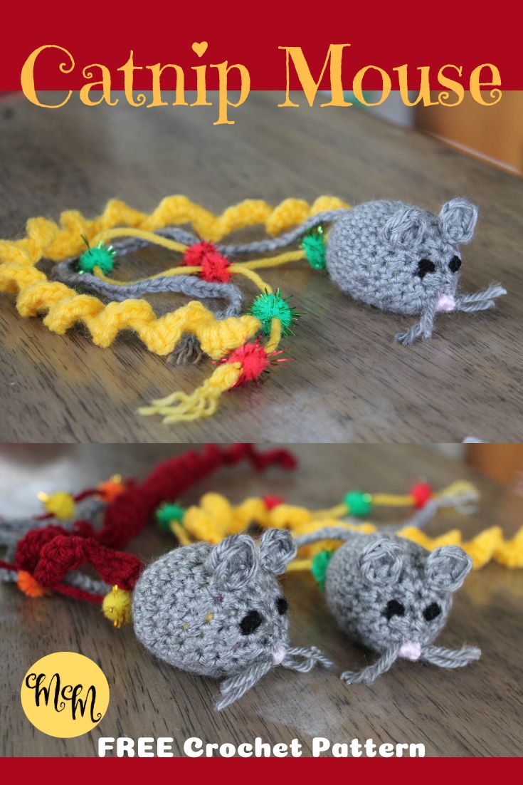 two crocheted mouses sitting on top of a wooden table