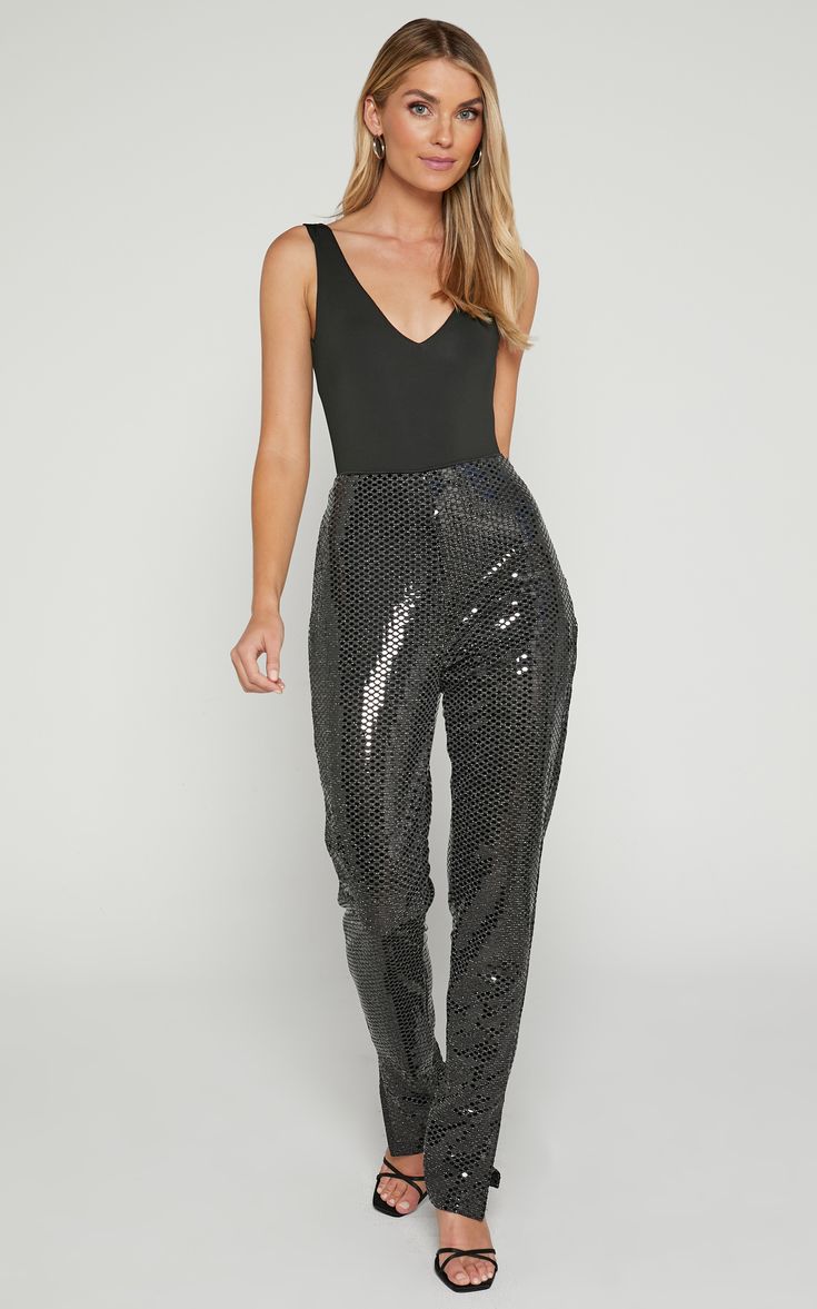 Make a statement at your next party with the Deola Pant - High Waisted Straight Leg in Black. These full-length pants are perfect for any occasion, offering a sleek and sophisticated look that will turn heads wherever you go. With their high-waisted design, they flatter your figure and accentuate your waistline, giving you confidence all night long. The straight leg cut adds an element of modernity to this classic style, making them versatile enough to dress up or down. Crafted from a comfortabl Trendy Party Pants, Trendy Leather Pants For Party, Trendy High-waisted Pants For Party, Sleek Summer Bottoms For Night Out, Sequin Straight Pants For Night Out, Trendy Party Trousers, Glamorous Stretch Bottoms For Night Out, Stretch Sequined Bottoms For Party, Stretch Sequin Bottoms For Evening