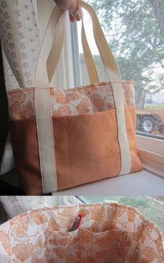 an orange and white bag sitting on top of a window sill