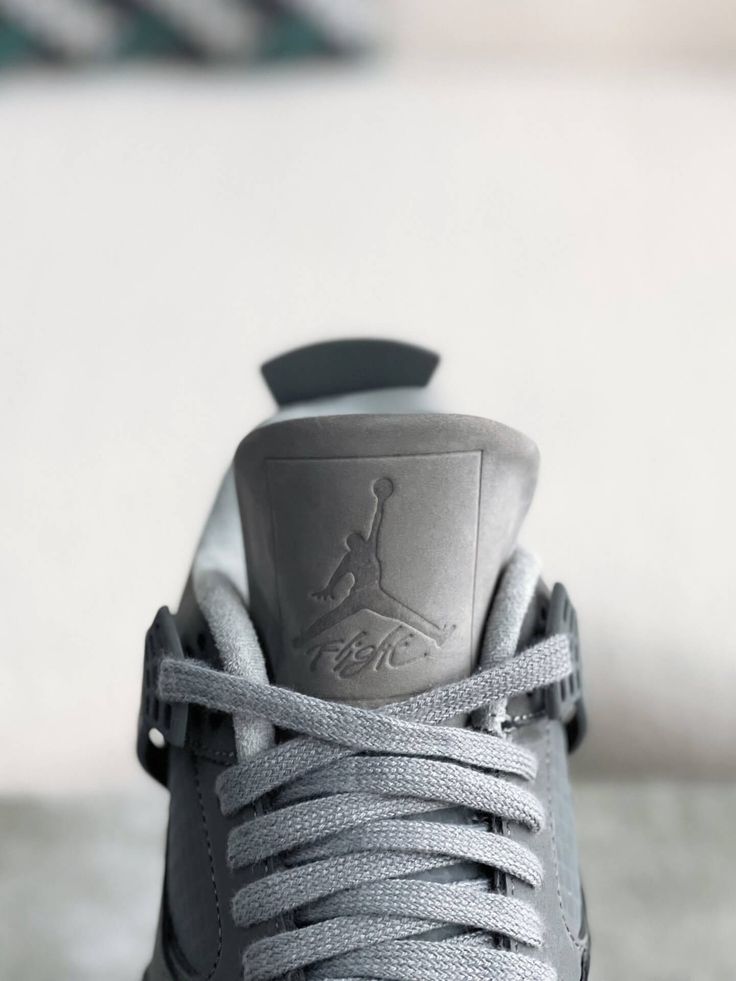 Embrace understated cool with these Air Jordan 4 Retro-inspired "Dark Grey" sneakers. This versatile colorway features a mix of premium grey tones across the upper, creating a sleek and sophisticated look. The iconic silhouette, with signature mesh netting and visible Air unit, delivers classic style and all-day comfort. Whether you're hitting the streets or the court, these sneakers are a must-have for any sneakerhead's collection. Modern Gray Sneakers With Laces, Gray Sporty Custom Sneakers For Light Sports, Sporty Gray Custom Sneakers For Light Sports, Gray High-top Sneakers With Perforations For Streetwear, Sporty Gray High-top Sneakers With Perforations, Gray Custom Sneakers With Translucent Outsole For Light Sports, Gray Custom Sneakers For Light Sports With Translucent Outsole, Urban Gray Custom Sneakers With Laces, Urban Style Custom Gray Sneakers With Laces