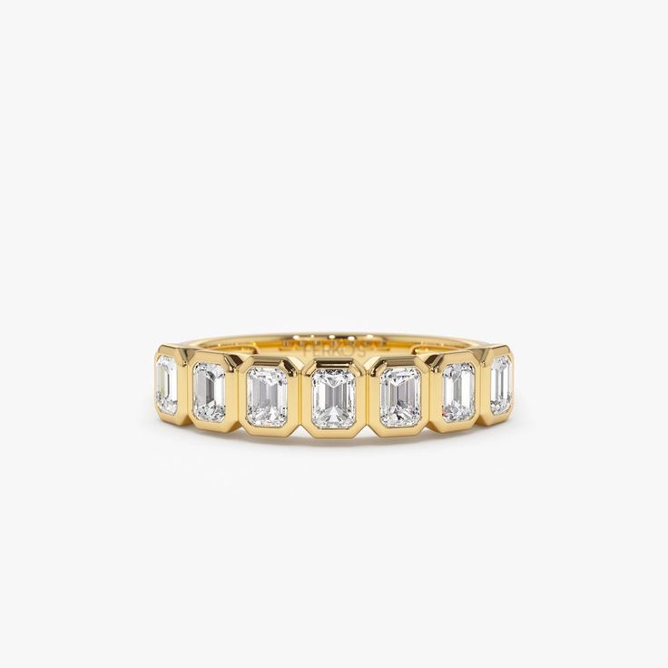 "14k Bezel Setting Emerald Cut Diamond Wedding Band / Emerald Cut Wedding Band 0.75 Ctw Genuine Emerald Cut Diamond Anniversary Ring by Ferko's Fine Jewelry Gold Kt: 14K (Please message me if you want 18K) Custom Gold Color: Rose Gold, Yellow Gold, White Gold EmeraldCut Diamond: 7 pcs 3.5 x 2.5 MM Total CTW: 0.75 CTW Ctw Diamond Color-Clarity: G Color Si Clarity Setting Type: Bezel Band Width: Starts off at 3MM and graduates down to 2MM If you have any additional questions about this ring, just Bezel Diamond Band, Classic Emerald Cut Half Eternity Jewelry, Bezel-set Baguette Cut Diamond Ring, Yellow Gold Baguette Cut Diamond Ring With Bezel Setting, Gold Lab-grown Diamond Eternity Band For Anniversary, Baguette Cut Diamond Ring With Bezel Setting, Anniversary Diamond Ring With Single Cut Octagon Diamonds, Anniversary Diamond Ring With Octagon Shape, Asscher Cut Diamond Wedding Ring With Bezel Setting