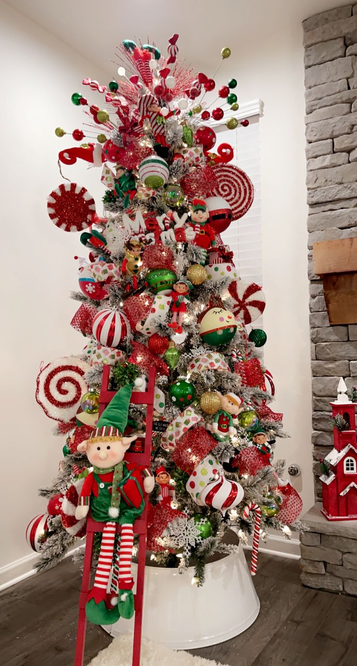 a christmas tree decorated with candy canes and ornaments