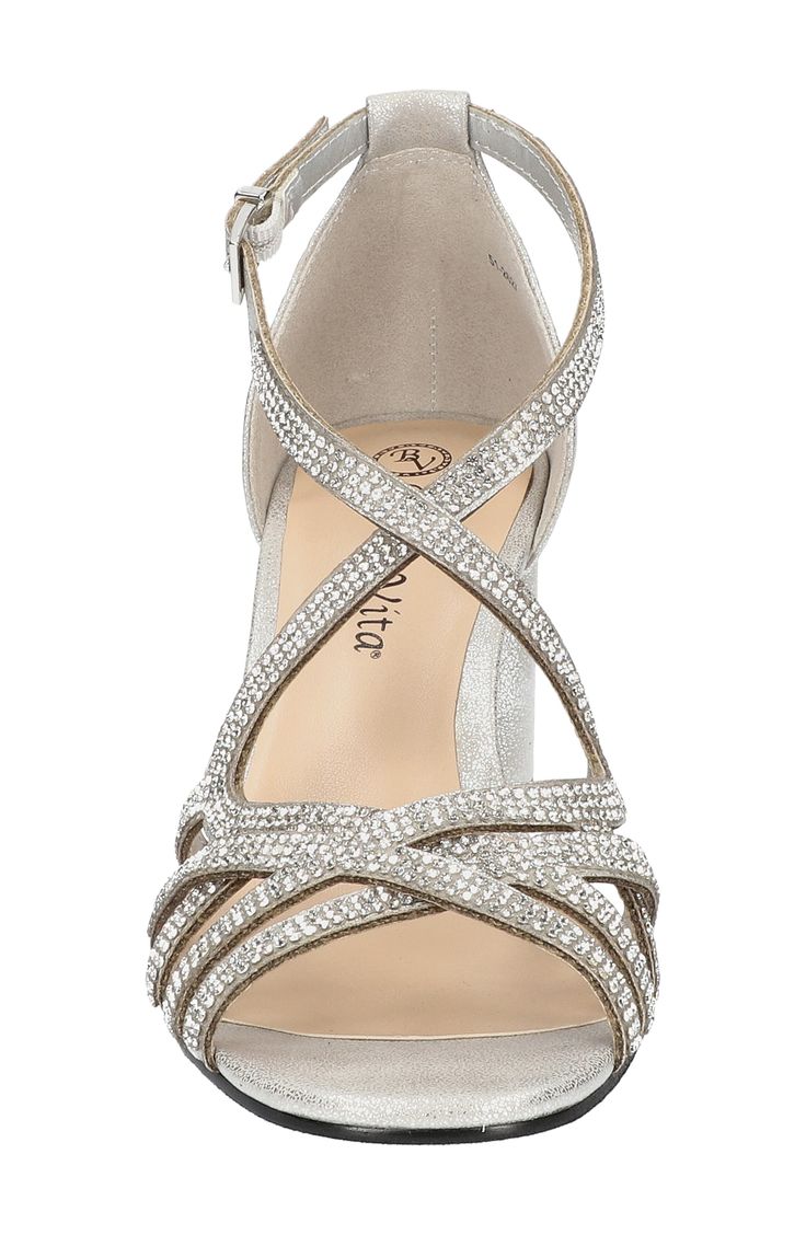 Sparkling straps interweave on this metallic sandal that'll be a highlight of your special occasion looks. Synthetic upper, lining and sole Imported Silver Sandals With 4-inch Heel For Prom, Silver Strappy Sandals With 4-inch Heel, Silver Open Heel Synthetic Sandals, Silver Synthetic Heels With Heel Strap, Silver Heels With Heel Strap In Synthetic, Synthetic Open Toe Heels For Gala, Open Toe Synthetic Heels For Gala, Gala Open Toe Synthetic Heels, Glamorous Synthetic Sandals For Gala