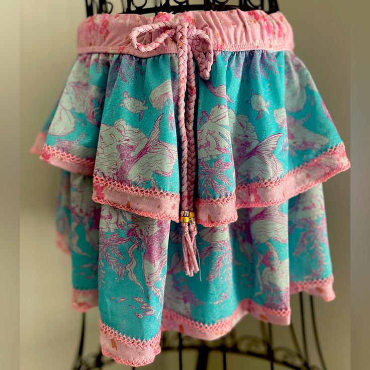 Questions? Leave A Comment Below! Nwt Pink Fitted Bohemian Mini Skirt, Spring Beachwear Skirt With Ruffles, Pink Ruffled Shorts For Beach, Pink Ruffled Mini Shorts, Pink Ruffled Mini Length Shorts, Pink Ruffled Mini Skirt, Pink Skort With Ruffles And Short Length, Pink Mini Skirt For Vacation, Pink Ruffled Short Skort