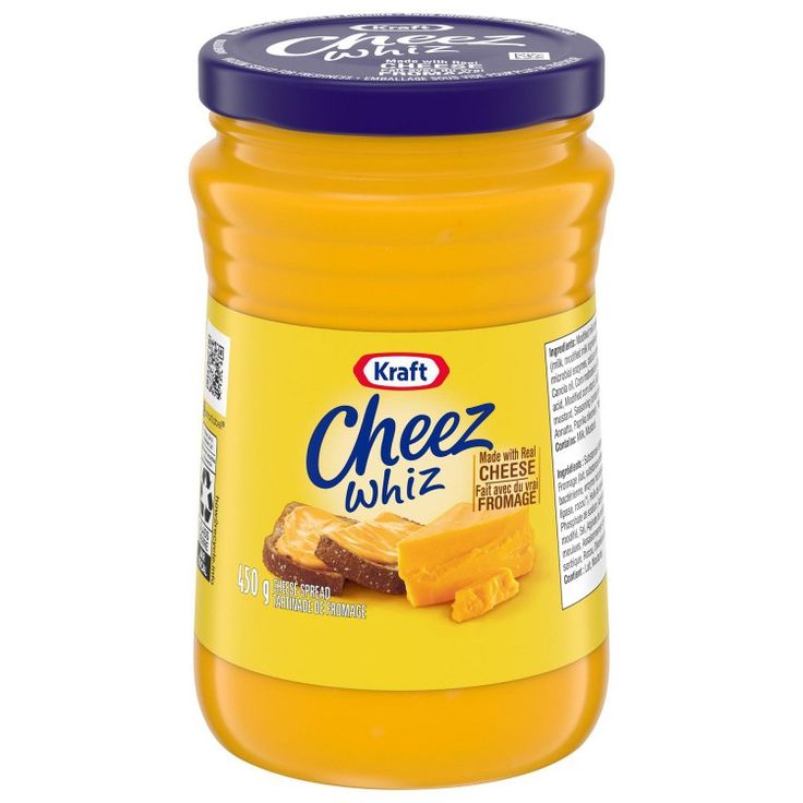 a jar of cheese whiz on a white background