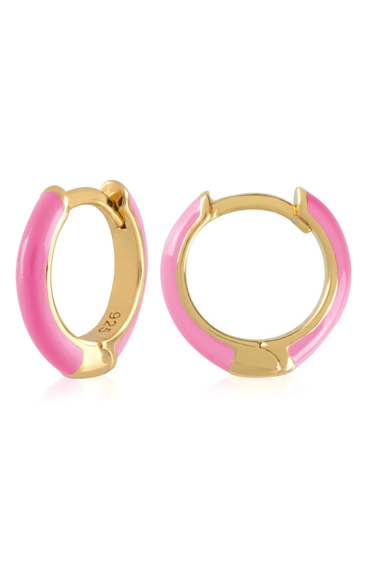 Easy-to-wear hoop earrings will add significant polish to even your most casual ensembles. 1/2" drop; 1/8" width Hinge with snap-post closure Sterling silver with goldtone plate/enamel Imported Enamel Huggie Earrings Perfect For Gifts, Nickel-free Enamel Round Hoop Earrings, Trendy Enamel Huggie Earrings, Pink Enamel Hoop Jewelry, Trendy Round Enamel Hoop Earrings, Nickel-free Enamel Hoop Earrings, Nickel Free Enamel Hoop Jewelry, Nickel-free Enamel Hoop Jewelry, Pink Hypoallergenic Small Hoop Huggie Earrings