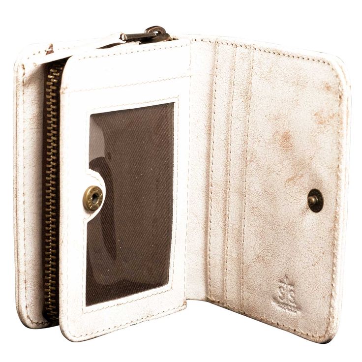 Experience the luxurious full grain leather of the Cremello Soni Wallet, with an irresistible crackled texture that reveals a soft tanned suede underneath. The buck stitch and threaded accents also showcase this supple suede, while distressed hardware adds the perfect touch to any outfit. Elevate your style with this must-have accessory. Features Soft, genuine leather exterior Zip around closure 1 interior id slot, 3 interior card slots; 1 zip coin/cash with divider 3.5" W X 4.5" H X 1" D Beige Leather Wallet For Daily Use, Beige Leather Wallet With Interior Card Slots, Beige Leather Wallet, Beige Leather Everyday Wallets, Everyday Beige Leather Wallet, Beige Leather Coin Purse With Coin Pocket, Leather Beige Coin Purse, Beige Leather Wallet With Zipper Closure, Children Bottoms