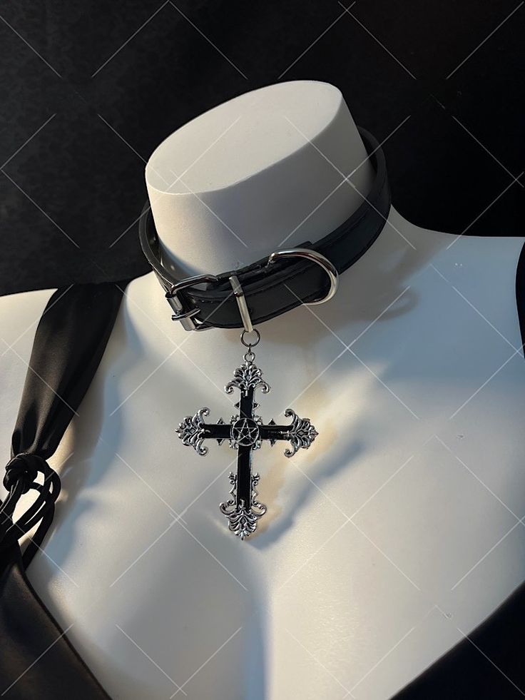 Embrace the edgy and punk vibe with our dark punk cross choker. This unique choker exudes a gothic and alternative aesthetic, perfect for expressing your individuality and subculture style. The choker features a striking cross pendant, adding a bold statement to your look.   Please note that this product includes one choker only. Affordable Metal Punk Choker, Emo Choker, Gothic Belt, Punk Aesthetics, Alternative Accessories, Punk Choker, Unique Choker, Vampire Necklace, Dark Punk