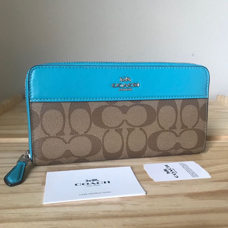 100% Authentic Coach Wallet 76873 Signature Accordion Zip Khaki /Aqua And Silver Hardware Brand New With Tags Designer Blue Wallet For Everyday Use, Blue Coach Wallets With Card Slots, Elegant Blue Coach Wallet, Blue Leather Coach Wallet, Blue Leather Wallet, Coach Coin Purse, Kate Spade Card Holder, Checkbook Wallet, Blue Wallet