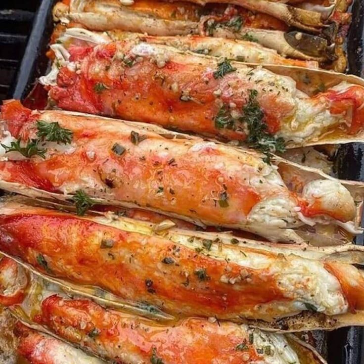 lobsters are cooked on the grill and ready to be grilled in the oven