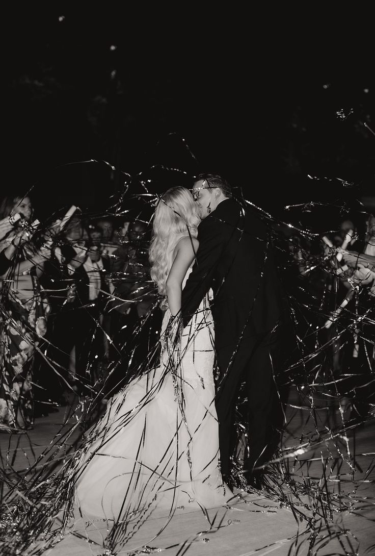 bride and groom leaving wedding with silver streamer exit Wedding Send Off Streamers, Silver Streamer Wedding Exit, Confetti Streamers Wedding, Streamer Send Off Wedding, Streamers Wedding Send Off, Streamer Wedding Send Off, Wedding Exit Streamers, Wedding Streamers Send Off, Streamer Exit Wedding