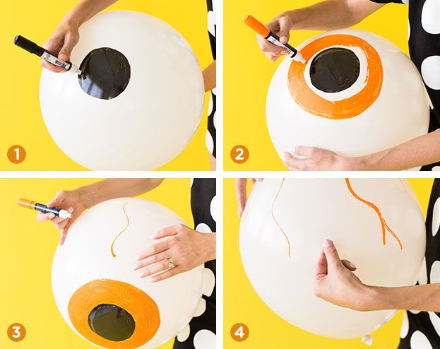 the process of making an eyeball balloon for halloween