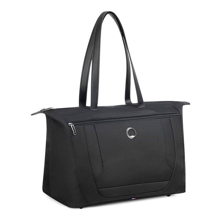 a black tote bag with zippers on the front and side pockets, sitting in front of a white background