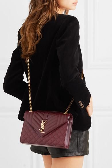 from @NET-A-PORTER's closet #saintlaurent Ysl Envelope Bag, Ysl Envelope, Ysl Crossbody Bag, Pants Ideas, Saint Laurent Sneakers, Ysl Handbags, Burgundy Bag, Ysl Bags, Bag Outfit