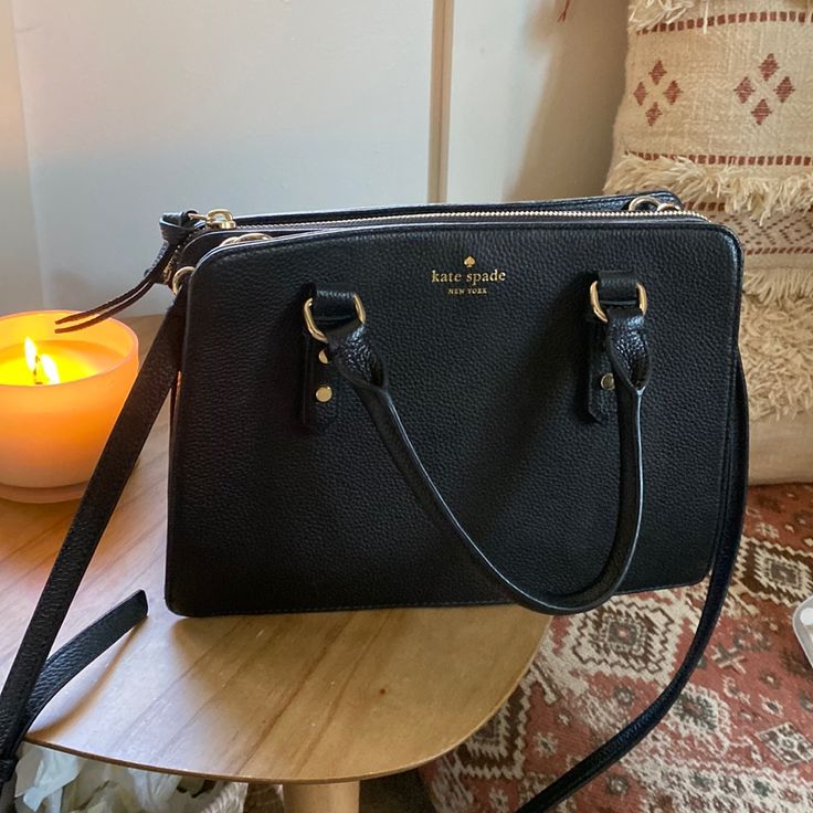 Never Used And In Great Condition! It’s Slightly Misshaped (Pictured) But Not Bad At All. Super Cute Basic Bag! Has A Removable Shoulder Strap So Can Be A Hand Bag Too. Picture Of My Hand Compared To Show Size Kate Spade Black Shoulder Bag For On-the-go, Kate Spade Black Bag With Zipper Closure, Black Kate Spade Bag With Zipper Closure, Kate Spade Bag With Zipper Closure And Double Handle, Kate Spade Double Handle Bag With Zipper Closure, Kate Spade Double Handle Bag With Zipper, Kate Spade Satchel Shoulder Bag With Zipper Closure, Kate Spade Satchel Shoulder Bag With Zipper, Kate Spade Shoulder Bag With Zipper For Everyday Use