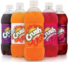 four bottles of crush orange and raspberry soda are shown in this image with the same color as each one