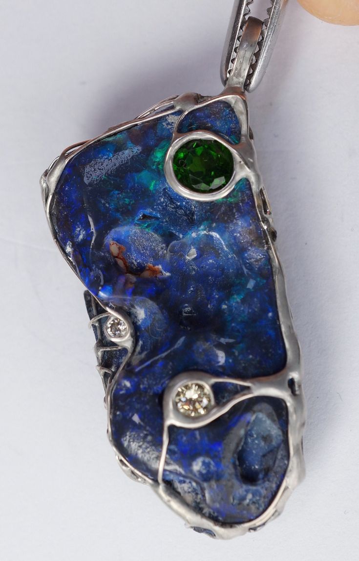 wonderful opal emerald diamond pendant Details: Pendant 41 x 20 x 5 mm Opal 34 x 16 x 5 mm, blue green fire, Australia Diopside, 5 mm 3 x Diamond, 1.8 mm, SI, brilliant white 925 silver, soldered Unique Blue Emerald Jewelry, Emerald Pendant Gemstone, Green Opal Fine Jewelry, Peacock Blue Opal Jewelry, Blue Opal Pendant Jewelry, Emerald Diamond Pendant, Fire Opal Green Necklace, Luxury Artisan Opal Necklace, Opal Multi-stone Pendant Necklace