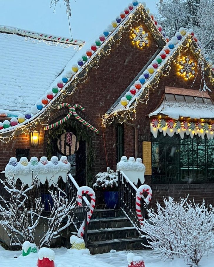 a house covered in christmas lights and candy canes