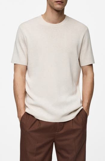 This neutral-hued and lightweight T-shirt takes you right into the chilly season with a look that layers well. Crewneck Short sleeves 45% polyester, 35% viscose, 20% cotton Hand wash, line dry Imported Casual Relaxed Fit Fine Knit T-shirt, Classic Neutral Tops For Layering, Casual Fine Knit T-shirt For Fall, Fine Knit Casual T-shirt For Fall, Fine Knit Short Sleeve T-shirt For Fall, Cream Fine Knit Crew Neck Top, Crew Neck T-shirt With Ribbed Neckline For Work, Casual Beige T-shirt For Fall, Casual Summer T-shirt