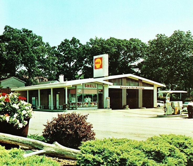 an old photo of a shell gas station