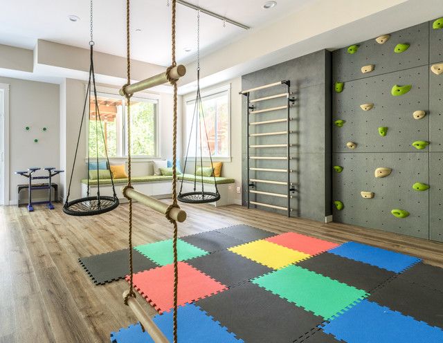 a child's play room with climbing equipment