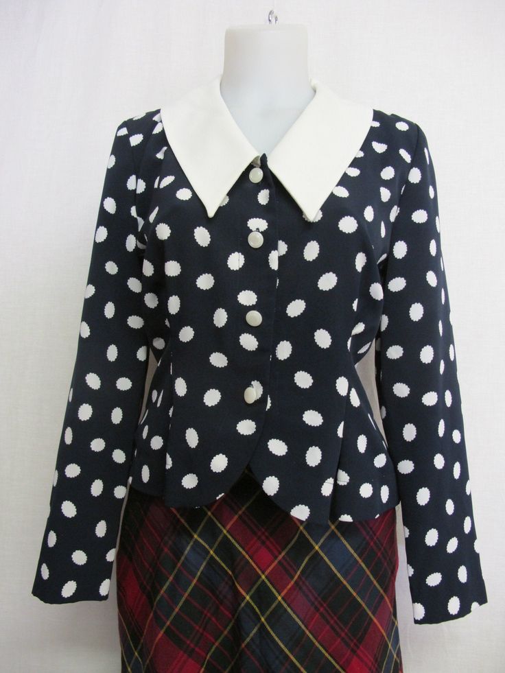 "Liz Claiborne Peplum Blouse ~Sassy~ Polka Dot Blouse ~This is a WOW~ Beautifully tailored and fitted Poly crepe A bit dress up! Button front Peplum waist Shoulder pads have been removed Small 4 Petite Bust 38\" Waist 30\" Hip 40\" Shoulder 16\" Length 19\" Excellent condition Looks unworn! https://www.etsy.com/shop/BelindasStyleShop" Chic Fitted Blouse With Peter Pan Collar, Classic Fitted Polka Dot Blouse, Fitted Polka Dot Blouse For Work, Fitted Long Sleeve Polka Dot Blouse, Retro Fitted Polka Dot Blouse, Classic Fitted Blouse With Peter Pan Collar, Classic Fitted Polka Dot Tops, Fitted Tops With Peter Pan Collar For Work, Fitted Workwear Top With Peter Pan Collar