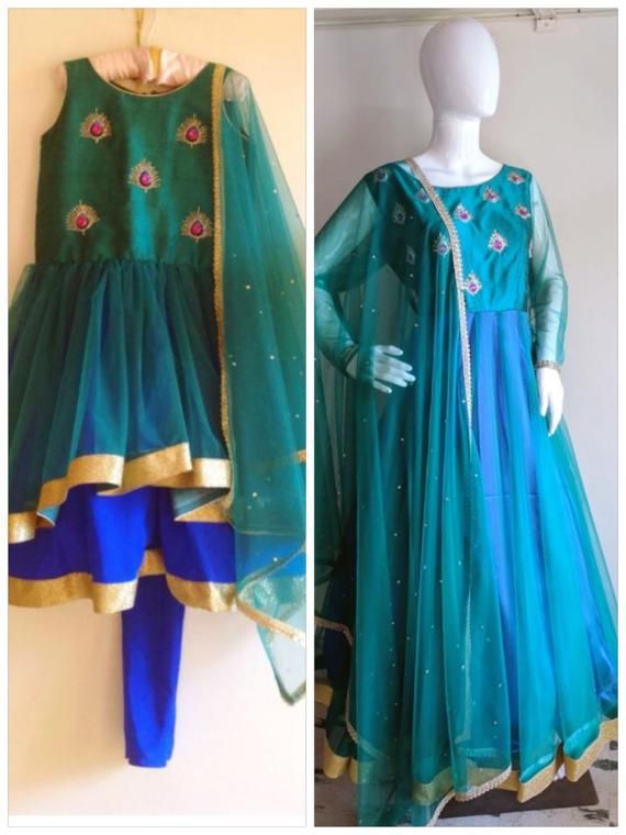 Mother daughter matching peacock anarkalis Anarkali Sets With Peacock Design For Wedding, Anarkali Lehenga With Peacock Design For Diwali, Diwali Anarkali Lehenga With Peacock Design, Festive Anarkali Set With Peacock Design, Festive Anarkali Choli With Peacock Design, Anarkali Traditional Wear With Peacock Design For Festive, Festive Anarkali Traditional Wear With Peacock Design, Bollywood Traditional Wear With Peacock Design, Anarkali Sets With Peacock Design For Diwali