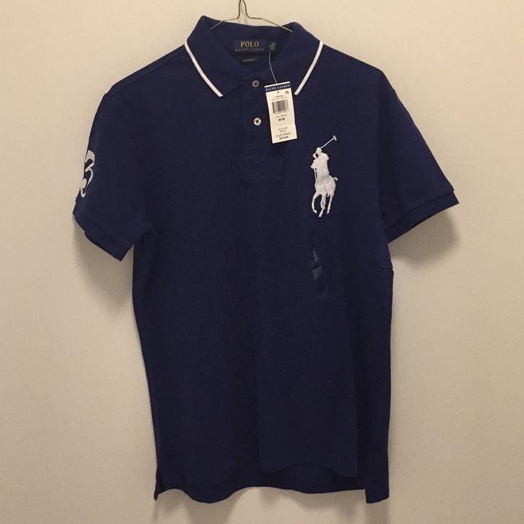 This Is A Blue Ralph Lauren Usa Polo And It Has Never Been Worn And It Includes The Tag Blue Collared Polo Shirt For Spring, Fitted Blue Polo Shirt For Spring, Blue Collared T-shirt For Spring, Blue Fitted Collared T-shirt, Ralph Lauren Blue Collared Shirt, Blue Collared Ralph Lauren Shirt, Casual Blue Ralph Lauren Shirt, Blue Polo Collar Shirt For Spring, Blue Ralph Lauren Crew Neck T-shirt