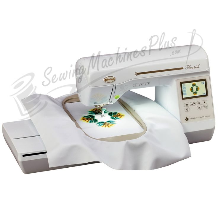 the sewing machine is white and has a flower design on it's front side