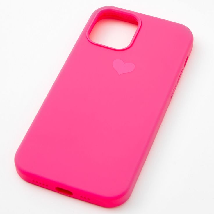 a pink iphone case sitting on top of a white surface with a heart sticker