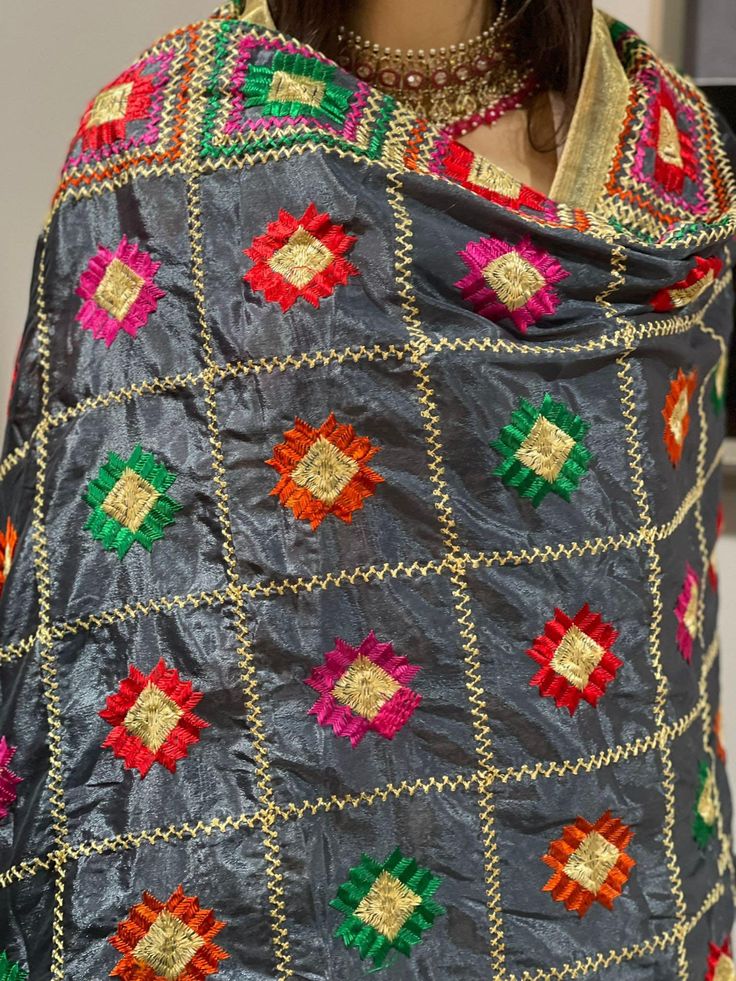 Product details:- Grey  phulkari embroidered Dupatta and has taping border. Size :- Length:-2.12 meters  Width:-37 inches  Material:- Polly chinon. Hand wash . Multicolor Embroidered Chanderi Fabric For Diwali, Festival Kurta With Multicolor Embroidery And Traditional Patterns, Celebration Dupatta With Embroidered Border, Traditional Festive Salwar Kameez With Multicolor Embroidery, Traditional Salwar Kameez With Multicolor Embroidery For Navratri, Traditional Multicolor Embroidered Salwar Kameez For Navratri, Traditional Salwar Kameez With Multicolor Embroidery For Festive Occasions, Embroidered Border Dupatta For Diwali Celebration, Festive Multicolor Embroidered Chanderi Fabric