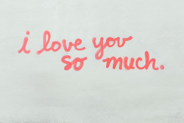 graffiti written on the side of a building that says i love you so much