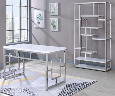 a white table sitting on top of a wooden floor next to a book shelf filled with books