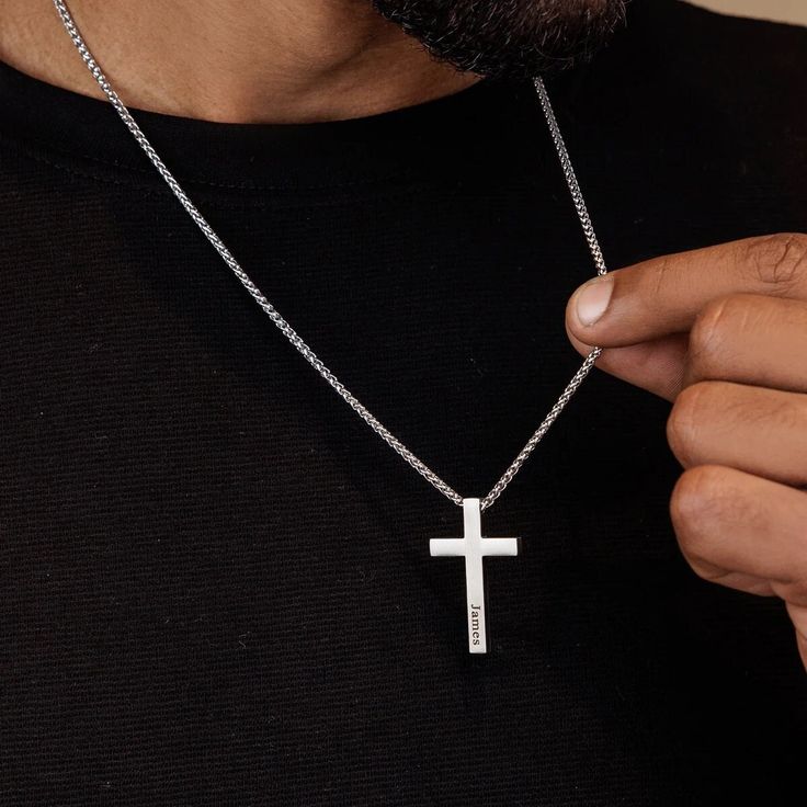 Introducing our exquisite personalized stainless steel cross necklace for men, a timeless and meaningful piece that adds a touch of faith to any outfit. This stunning necklace is available in both silver and gold finishes, allowing you to choose the one that perfectly suits your style. Made with high-quality stainless steel, this necklace is durable and long-lasting, making it a perfect gift for yourself or a loved one. Add a custom touch by personalizing it with a name, date, or special message Silver Cross Necklace For Father's Day Gift, Gift Stainless Steel Cross Pendant Necklace, Personalized White Cross Necklace, Stainless Steel Cross Pendant Necklace For Gift, Personalized Silver Cross Pendant Necklace, Stainless Steel Cross Necklace For Anniversary, Stainless Steel Crucifix Cross Necklace As Gift, Minimalist Personalized Cross Pendant Necklace, Personalized Cross Necklace For Father's Day